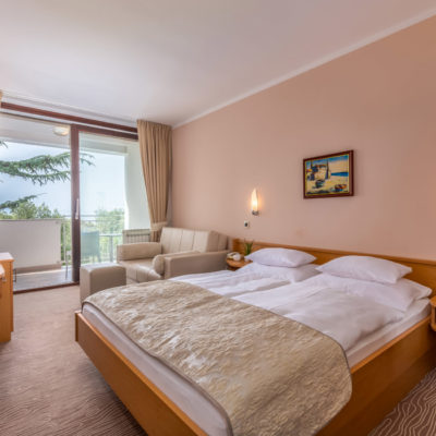 Double room with balcony oriented at the sea
